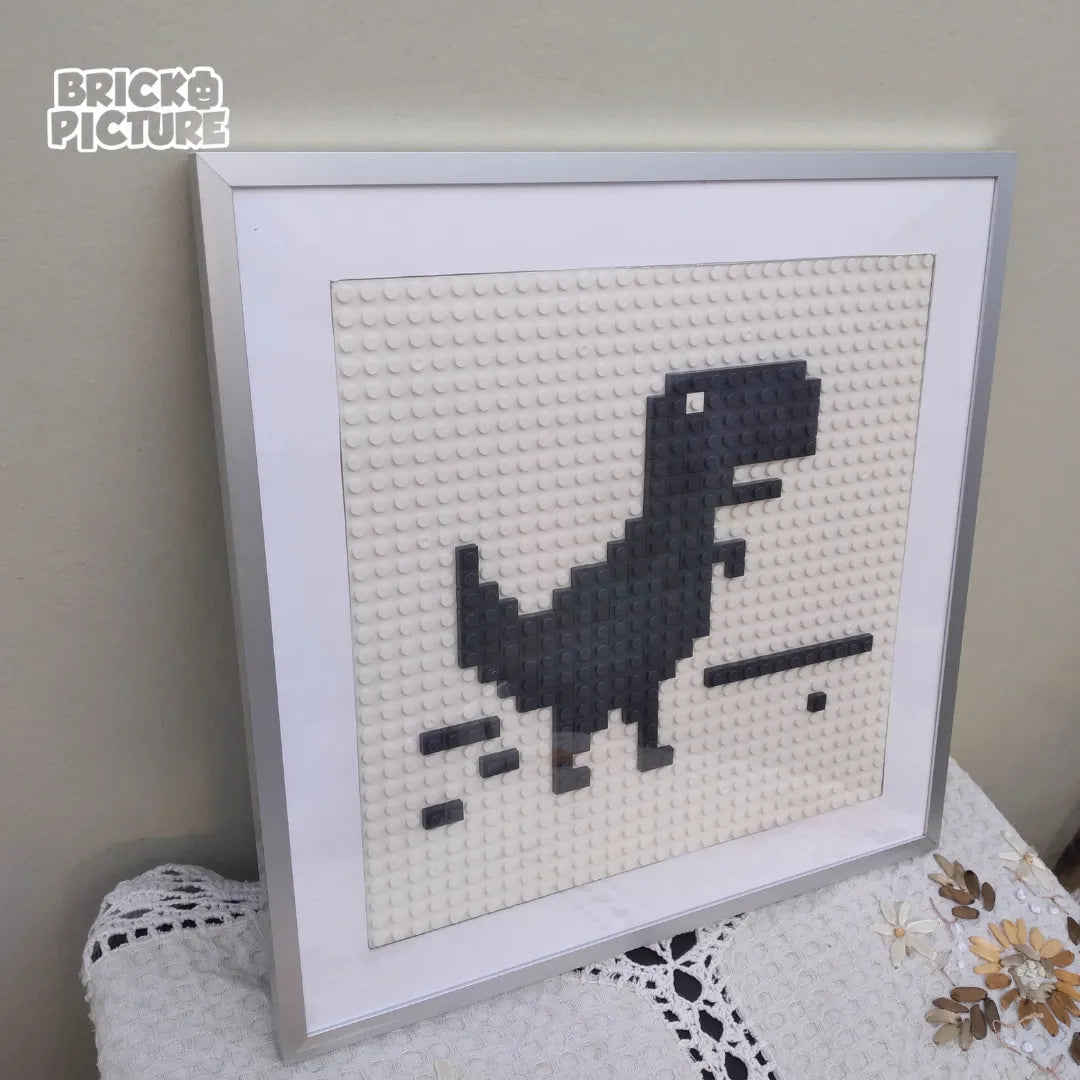 Cuadro Pixel Art Dinosaurio de Chrome – Diseño enmarcado de 200 piezas tipo Lego (32 cm)