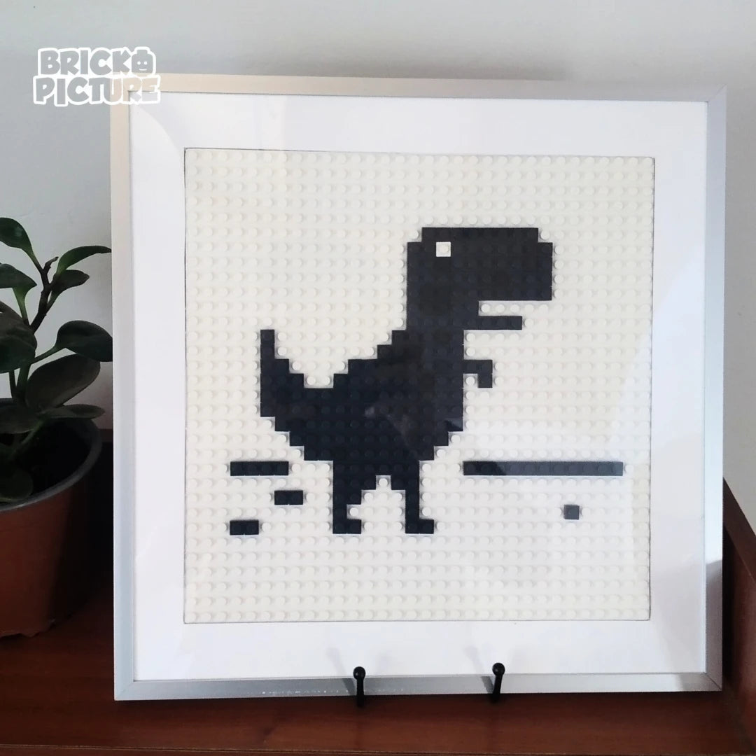 Cuadro Pixel Art Dinosaurio de Chrome – Diseño enmarcado de 200 piezas tipo Lego (32 cm)