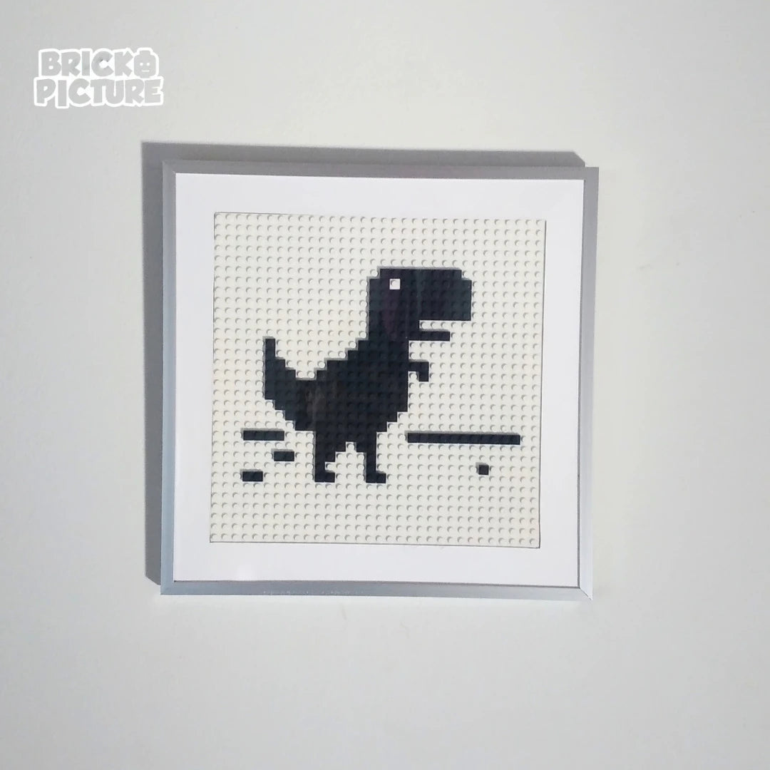 Cuadro Pixel Art Dinosaurio de Chrome – Diseño enmarcado de 200 piezas tipo Lego (32 cm)