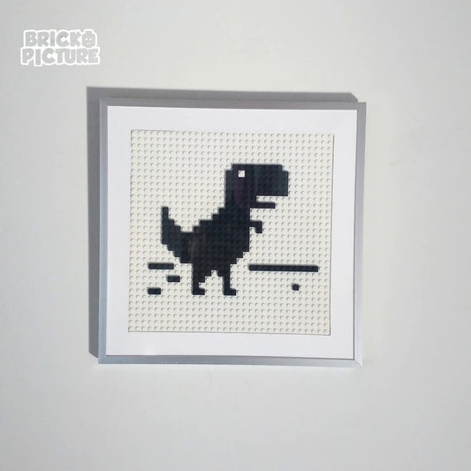 Cuadro Pixel Art Dinosaurio de Chrome – Diseño enmarcado de 200 piezas tipo Lego (32 cm)